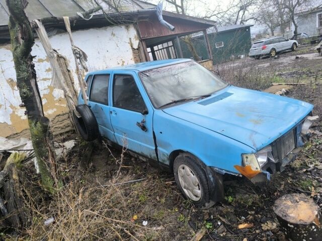 Синий Фиат Уно, объемом двигателя 9 л и пробегом 100 тыс. км за 238 $, фото 1 на Automoto.ua