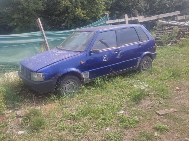 Синий Фиат Уно, объемом двигателя 1 л и пробегом 300 тыс. км за 250 $, фото 1 на Automoto.ua