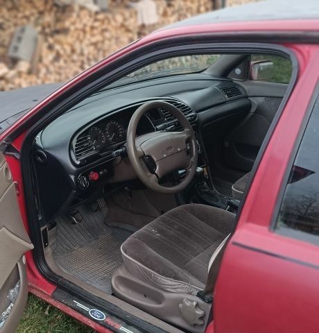 Красный Форд Контур, объемом двигателя 2 л и пробегом 136 тыс. км за 1181 $, фото 1 на Automoto.ua