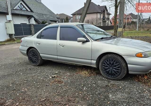 Сірий Форд Контур, об'ємом двигуна 2 л та пробігом 270 тис. км за 1200 $, фото 1 на Automoto.ua