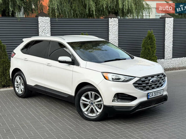 Белый Форд Эдж, объемом двигателя 2 л и пробегом 100 тыс. км за 15799 $, фото 1 на Automoto.ua