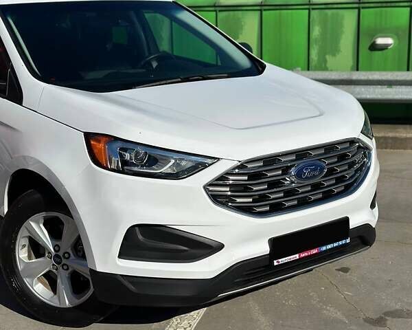 Білий Форд Едж, об'ємом двигуна 2 л та пробігом 103 тис. км за 15900 $, фото 1 на Automoto.ua