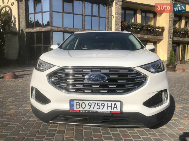 Білий Форд Едж, об'ємом двигуна 2 л та пробігом 111 тис. км за 19500 $, фото 1 на Automoto.ua