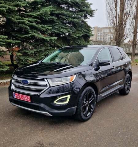 Черный Форд Эдж, объемом двигателя 2 л и пробегом 211 тыс. км за 14800 $, фото 1 на Automoto.ua