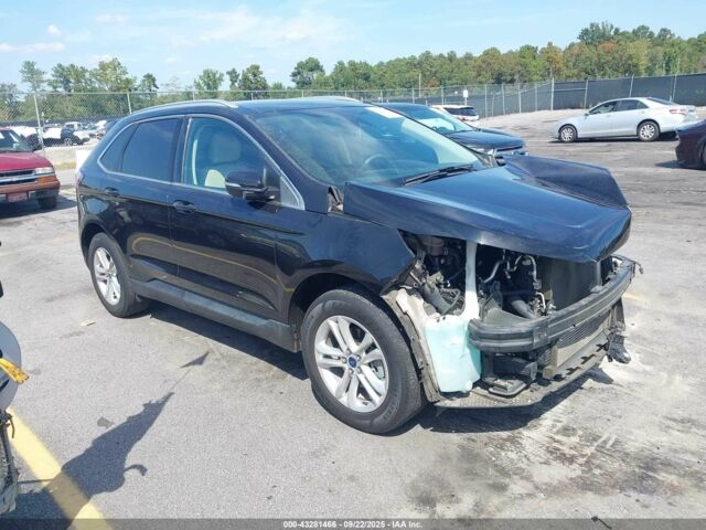 Черный Форд Эдж, объемом двигателя 2 л и пробегом 114 тыс. км за 10800 $, фото 1 на Automoto.ua