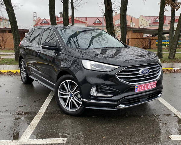 Черный Форд Эдж, объемом двигателя 2 л и пробегом 128 тыс. км за 18499 $, фото 1 на Automoto.ua