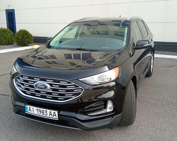 Черный Форд Эдж, объемом двигателя 2 л и пробегом 75 тыс. км за 19500 $, фото 1 на Automoto.ua