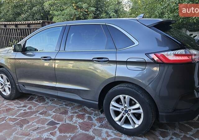 Серый Форд Эдж, объемом двигателя 2 л и пробегом 179 тыс. км за 20000 $, фото 1 на Automoto.ua