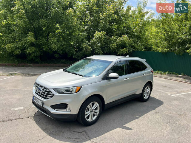 Серый Форд Эдж, объемом двигателя 2 л и пробегом 210 тыс. км за 19000 $, фото 1 на Automoto.ua