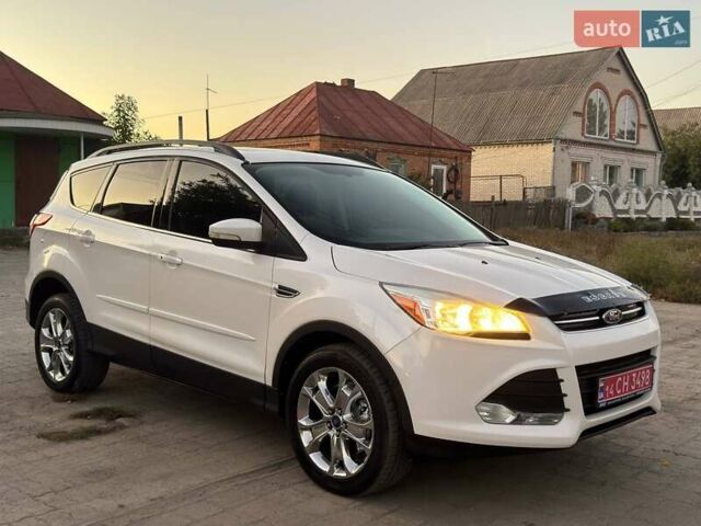 Белый Форд Эскейп, объемом двигателя 2 л и пробегом 140 тыс. км за 11850 $, фото 1 на Automoto.ua