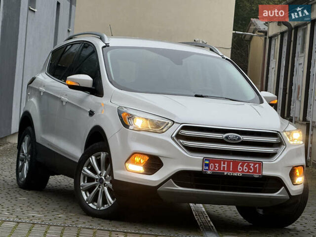 Белый Форд Эскейп, объемом двигателя 1.5 л и пробегом 169 тыс. км за 12900 $, фото 1 на Automoto.ua