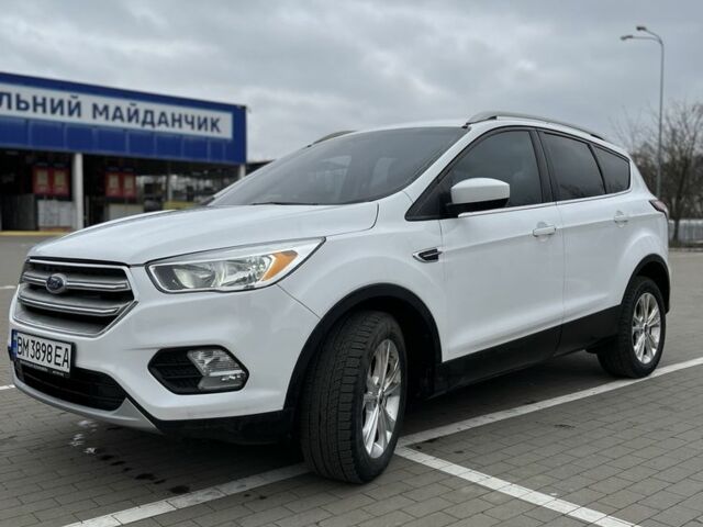 Белый Форд Эскейп, объемом двигателя 2 л и пробегом 143 тыс. км за 14200 $, фото 1 на Automoto.ua
