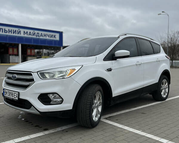 Белый Форд Эскейп, объемом двигателя 2 л и пробегом 148 тыс. км за 14200 $, фото 1 на Automoto.ua