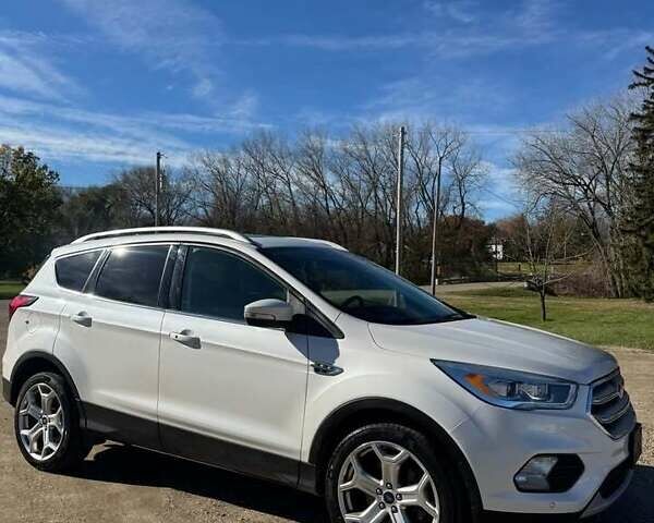 Белый Форд Эскейп, объемом двигателя 2 л и пробегом 119 тыс. км за 12500 $, фото 1 на Automoto.ua