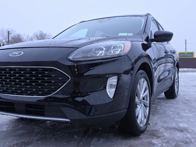 Черный Форд Эскейп, объемом двигателя 2 л и пробегом 44 тыс. км за 19999 $, фото 1 на Automoto.ua