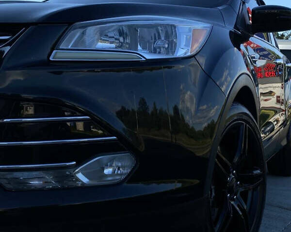 Черный Форд Эскейп, объемом двигателя 2 л и пробегом 220 тыс. км за 10300 $, фото 1 на Automoto.ua