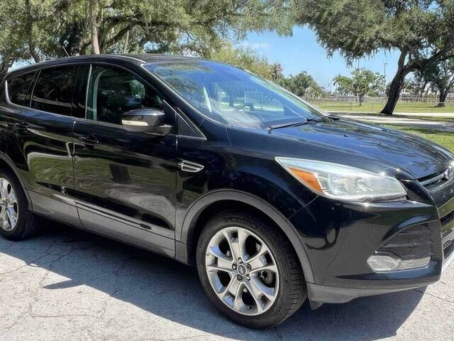 Черный Форд Эскейп, объемом двигателя 2 л и пробегом 87 тыс. км за 2100 $, фото 1 на Automoto.ua