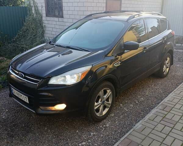 Черный Форд Эскейп, объемом двигателя 1.6 л и пробегом 220 тыс. км за 8500 $, фото 1 на Automoto.ua