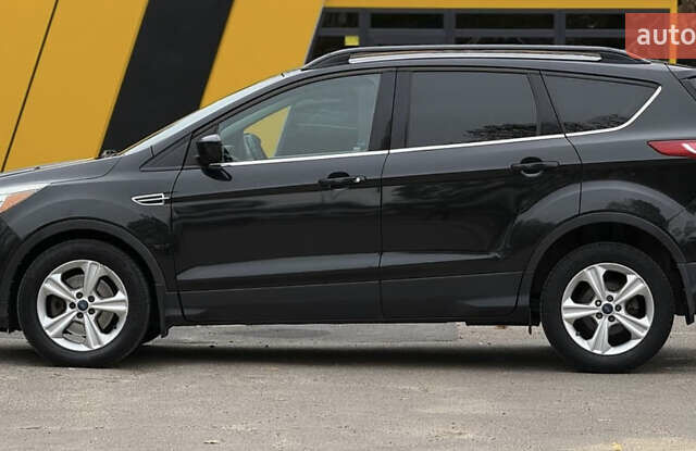 Чорний Форд Ескейп, об'ємом двигуна 2 л та пробігом 225 тис. км за 11000 $, фото 1 на Automoto.ua