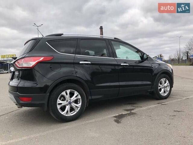 Черный Форд Эскейп, объемом двигателя 2 л и пробегом 151 тыс. км за 13499 $, фото 1 на Automoto.ua
