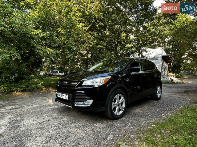 Чорний Форд Ескейп, об'ємом двигуна 2 л та пробігом 203 тис. км за 11400 $, фото 1 на Automoto.ua