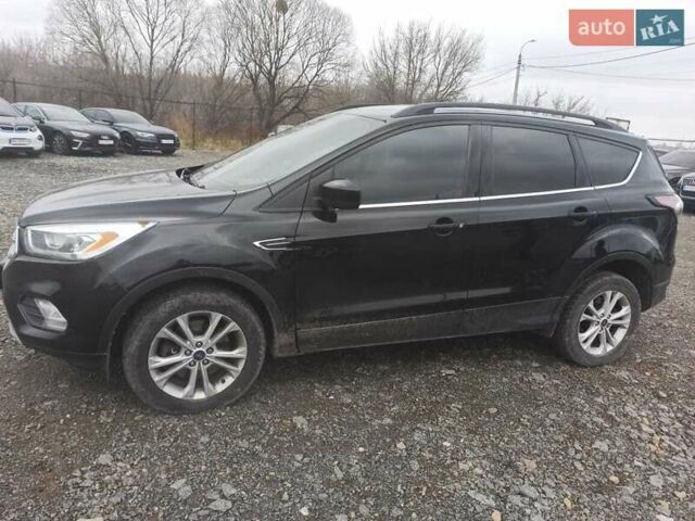 Черный Форд Эскейп, объемом двигателя 2 л и пробегом 147 тыс. км за 12500 $, фото 1 на Automoto.ua