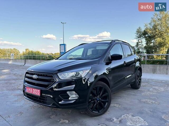Черный Форд Эскейп, объемом двигателя 2 л и пробегом 185 тыс. км за 13150 $, фото 1 на Automoto.ua
