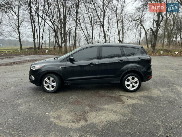 Черный Форд Эскейп, объемом двигателя 2.5 л и пробегом 200 тыс. км за 11700 $, фото 1 на Automoto.ua