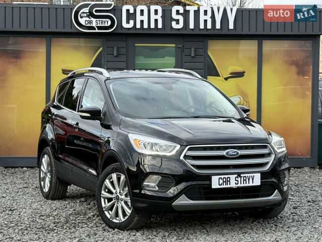 Черный Форд Эскейп, объемом двигателя 1.5 л и пробегом 146 тыс. км за 12700 $, фото 1 на Automoto.ua