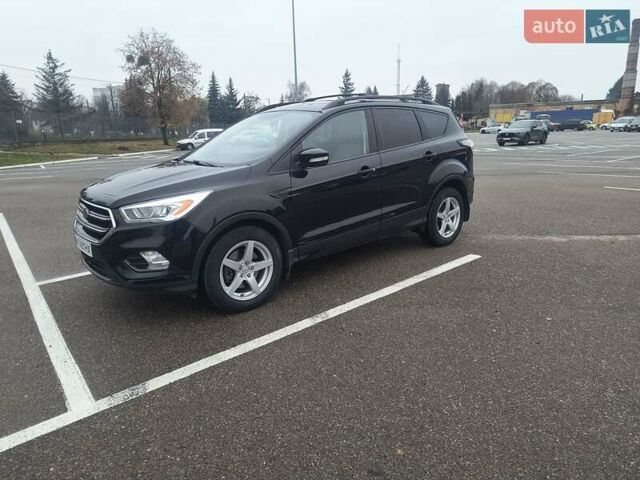 Черный Форд Эскейп, объемом двигателя 2 л и пробегом 232 тыс. км за 10000 $, фото 1 на Automoto.ua