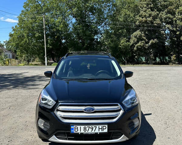 Черный Форд Эскейп, объемом двигателя 2 л и пробегом 111 тыс. км за 13300 $, фото 1 на Automoto.ua