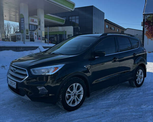 Чорний Форд Ескейп, об'ємом двигуна 1.5 л та пробігом 133 тис. км за 11999 $, фото 1 на Automoto.ua