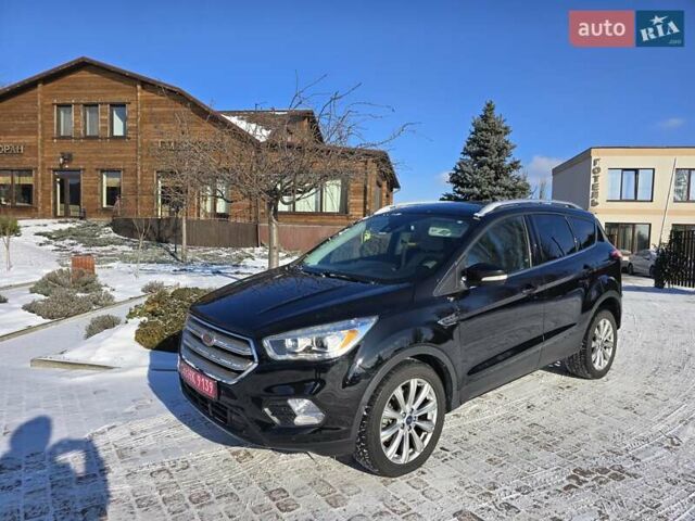 Черный Форд Эскейп, объемом двигателя 2 л и пробегом 193 тыс. км за 13599 $, фото 1 на Automoto.ua