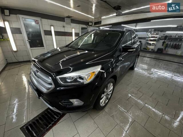 Черный Форд Эскейп, объемом двигателя 2 л и пробегом 88 тыс. км за 17000 $, фото 1 на Automoto.ua