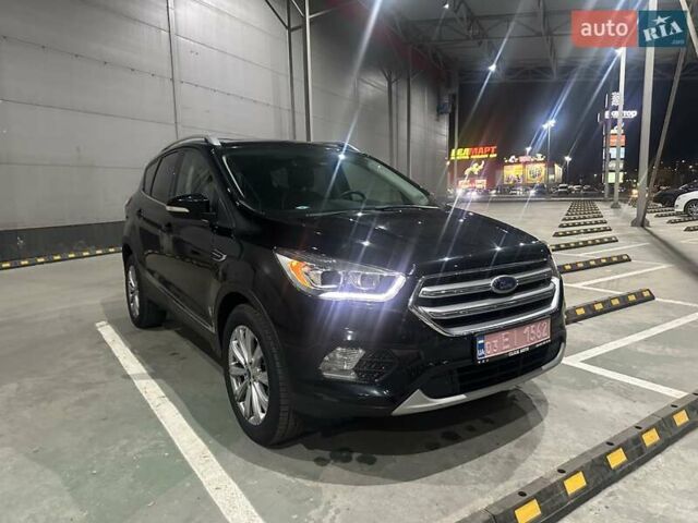 Черный Форд Эскейп, объемом двигателя 2 л и пробегом 98 тыс. км за 14399 $, фото 1 на Automoto.ua