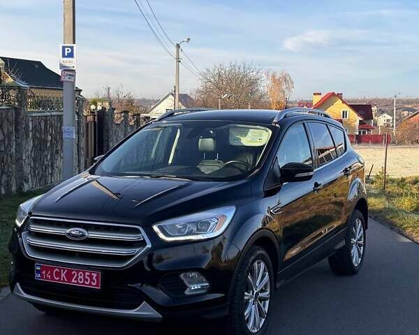 Чорний Форд Ескейп, об'ємом двигуна 1.5 л та пробігом 203 тис. км за 11999 $, фото 1 на Automoto.ua