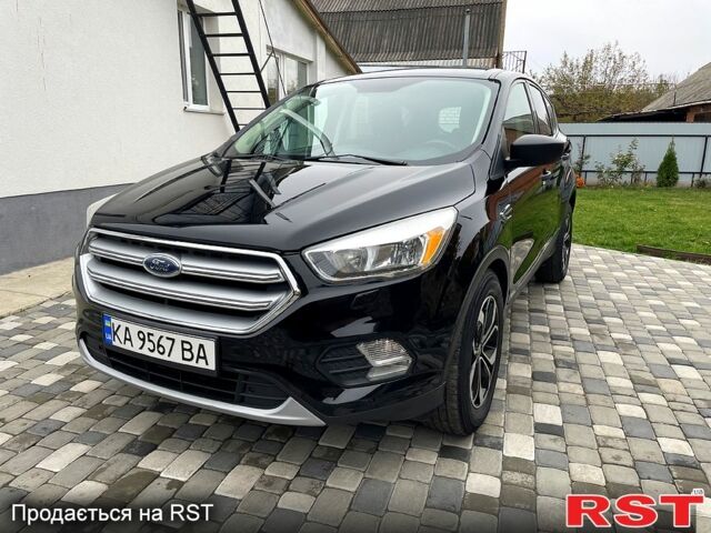 Черный Форд Эскейп, объемом двигателя 2.5 л и пробегом 190 тыс. км за 13000 $, фото 1 на Automoto.ua