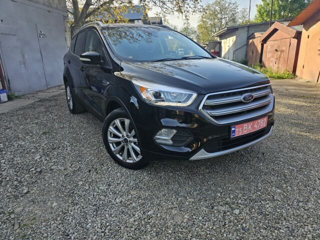 Черный Форд Эскейп, объемом двигателя 2 л и пробегом 194 тыс. км за 12500 $, фото 1 на Automoto.ua