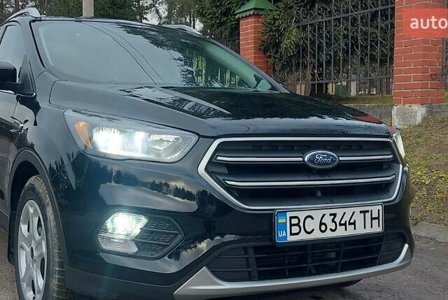Черный Форд Эскейп, объемом двигателя 2.5 л и пробегом 82 тыс. км за 15400 $, фото 1 на Automoto.ua