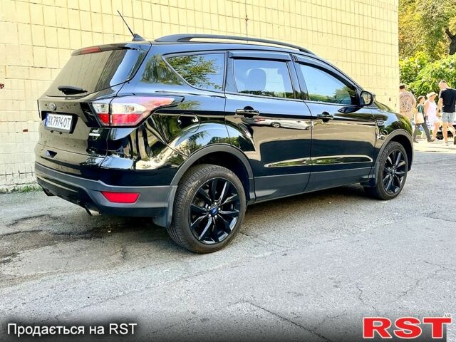 Черный Форд Эскейп, объемом двигателя 1.5 л и пробегом 207 тыс. км за 11550 $, фото 1 на Automoto.ua