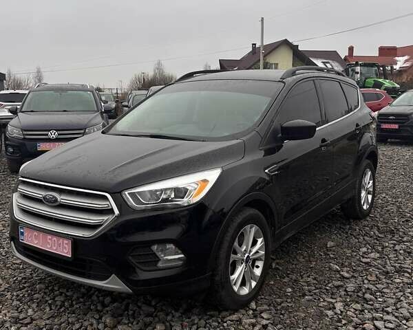 Чорний Форд Ескейп, об'ємом двигуна 1.5 л та пробігом 245 тис. км за 11499 $, фото 1 на Automoto.ua