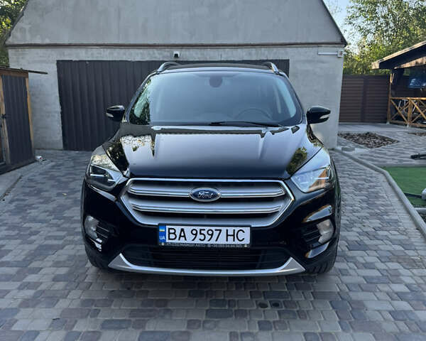 Чорний Форд Ескейп, об'ємом двигуна 2 л та пробігом 76 тис. км за 15900 $, фото 1 на Automoto.ua