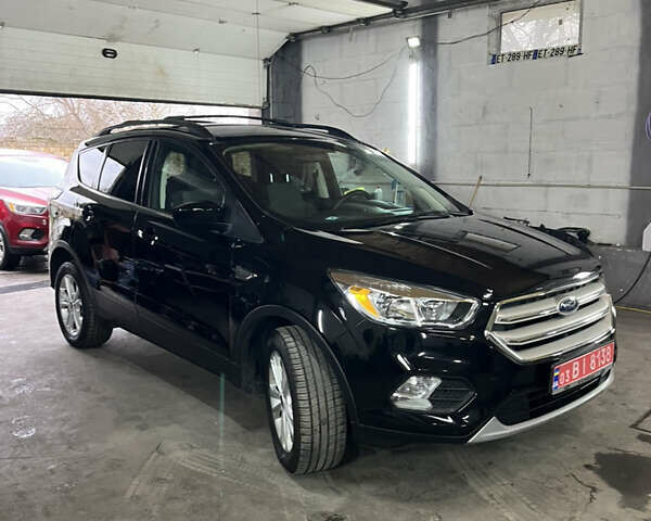 Черный Форд Эскейп, объемом двигателя 1.5 л и пробегом 170 тыс. км за 11200 $, фото 1 на Automoto.ua