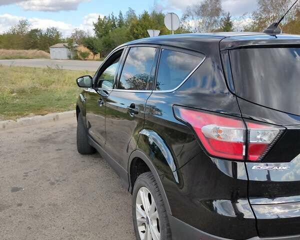 Чорний Форд Ескейп, об'ємом двигуна 1.5 л та пробігом 117 тис. км за 11000 $, фото 1 на Automoto.ua