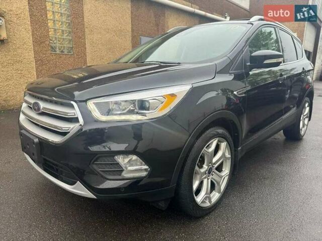 Черный Форд Эскейп, объемом двигателя 2 л и пробегом 100 тыс. км за 3000 $, фото 1 на Automoto.ua