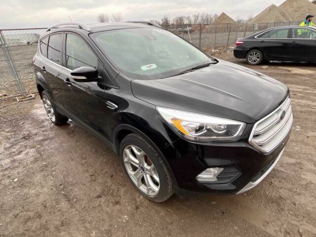 Черный Форд Эскейп, объемом двигателя 2 л и пробегом 115 тыс. км за 9900 $, фото 1 на Automoto.ua