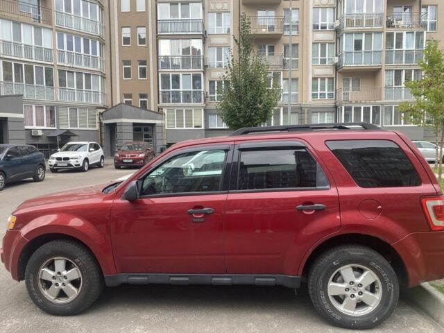 Червоний Форд Ескейп, об'ємом двигуна 3 л та пробігом 242 тис. км за 8900 $, фото 1 на Automoto.ua
