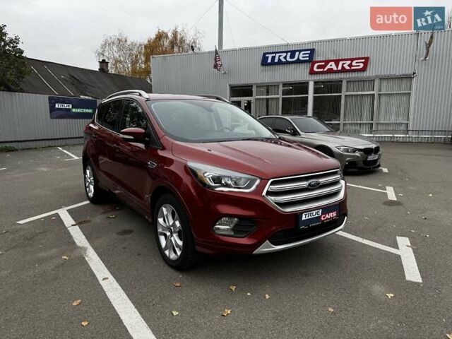 Красный Форд Эскейп, объемом двигателя 2 л и пробегом 127 тыс. км за 14500 $, фото 1 на Automoto.ua