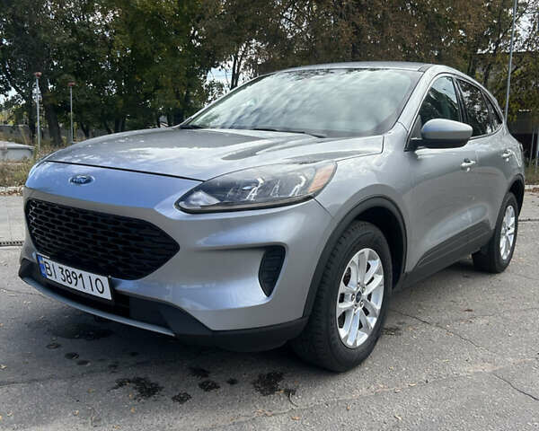 Серый Форд Эскейп, объемом двигателя 2.49 л и пробегом 156 тыс. км за 18700 $, фото 1 на Automoto.ua