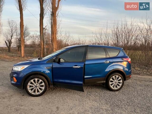 Синий Форд Эскейп, объемом двигателя 2.5 л и пробегом 131 тыс. км за 12600 $, фото 1 на Automoto.ua
